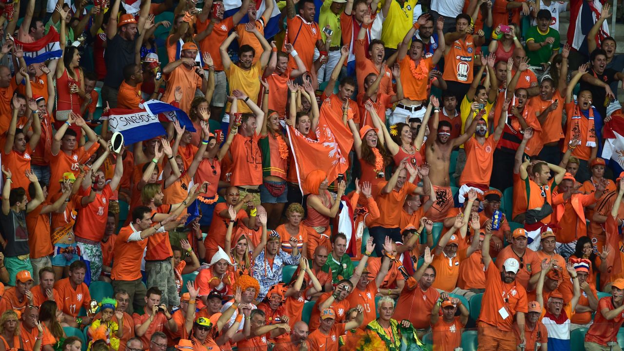 Dutch supporters cheer during the match. 