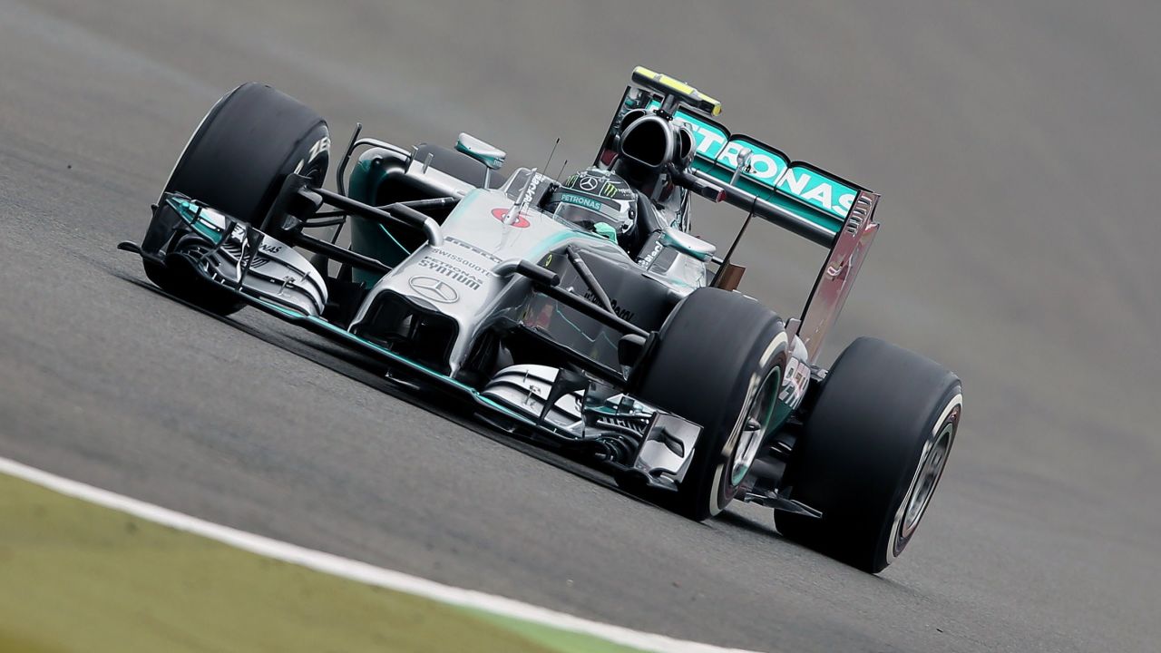 Mercedes-AMG's German driver Nico Rosberg drives during the qualifying session at the Silverstone circuit in Silverstone on July 5, 2014 ahead of the British Formula One Grand Prix. AFP PHOTO / ANDREW YATES (Photo credit should read ANDREW YATES/AFP/Getty Images