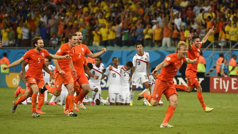 Netherlands team members celebrate after defeating Costa Rica during the penalty shootout after extra time in their quarterfinal football match on Saturday, July 5.