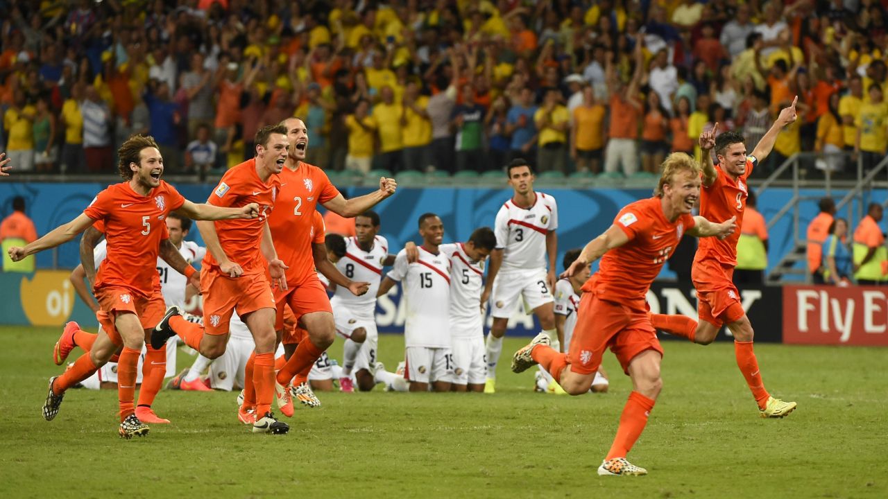 Netherlands team members celebrate after defeating Costa Rica during the penalty shootout after extra time in their quarterfinal football match on Saturday, July 5. 