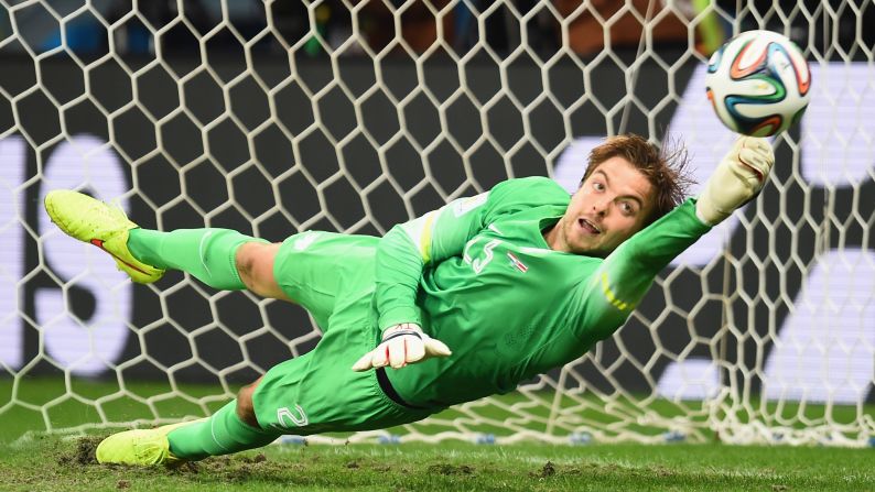 Tim Krul of the Netherlands knocks away a penalty kick by Michael Umana of Costa Rica.