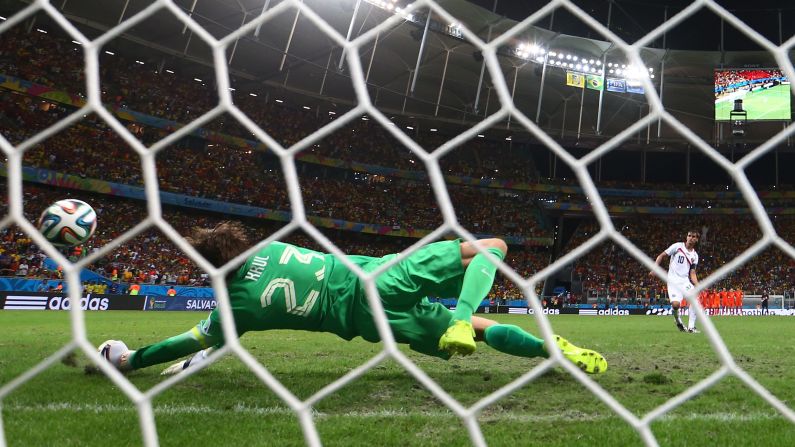 Goalkeeper Tim Krul of the Netherlands saves the penalty shot of Bryan Ruiz of Costa Rica.