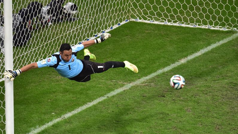 Costa Rica goalkeeper Keylor Navas jumps to make a save.