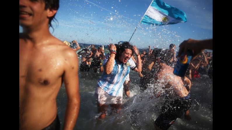 Argentina fans on Copacabana Beach celebrate their victory over Belgium on July 5. Argentina advanced to the World Cup semifinals for the first time in 24 years. 