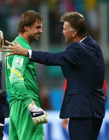Dutch goalkeeper Tim Krul (left) is congratulated by his coach Louis van Gaal following his success in the penalty shootout against Costa Rica in the quarterfinals. Van Gaal sent on the Newcastle United keeper in the last minute of extra time.