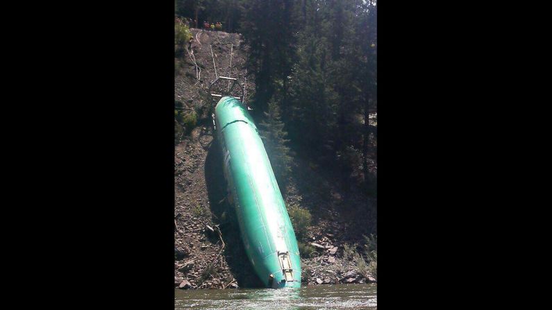 Montana Rail Link spokeswoman Lynda Frost said a crew of 50 is working on the steep bank with eight heavy equipment machines. Removing the three fuselages could take until Tuesday.