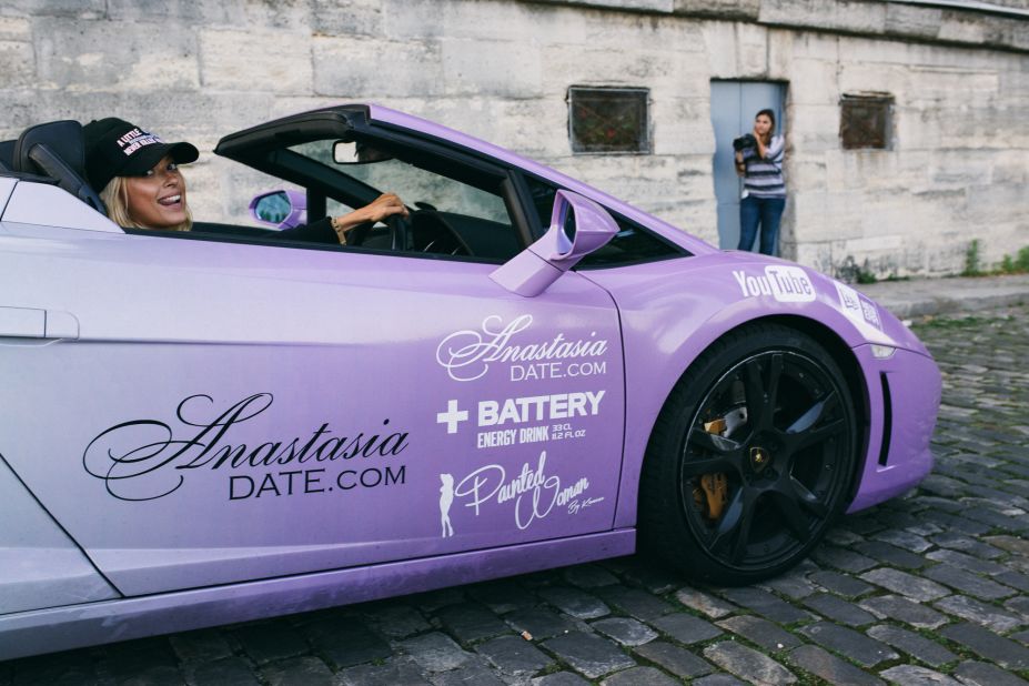 Dating website AnastasiaDate tricked out a Lamborghini into an electric violet chariot and threw two gorgeous women into the seats. The pair of Russians caused a sensation everywhere they went.
