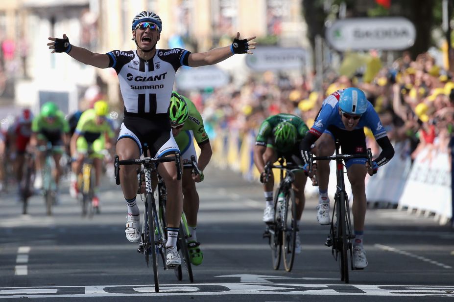 Marcel Kittel of the Giant-Shimano team celebrates his victory in the first stage of the tour. 