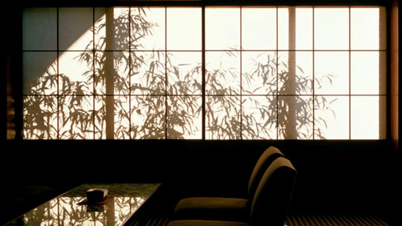 In a corner of the lobby, shoji doors back lit with shadows of swaying bamboo resemble a Japanese ink painting brought to life.