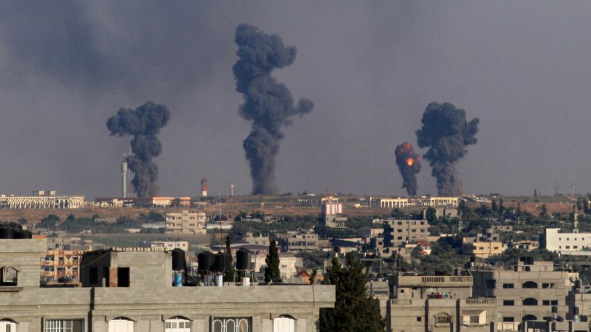 A ball of fire is seen following an Israel airstrike on Gaza International Airport in Rafah, southern Gaza, on July 7, 2014.