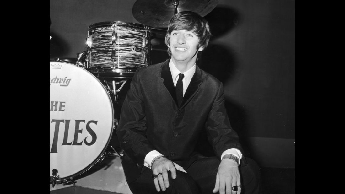 Suit and tie was a staple in the early days for British drummer Ringo Starr, pictured here on his 24th birthday in 1964.The look was typical of the British "Mod" subculture, though when asked in 'A Hard Day's Night' if he was a "mod or a rocker," Ringo replied, "I'm a mocker."