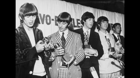 In 1966 The Beatles, pictured here with their manager Brian Epstein (right), received the Golden Otto award for being 'the best Beat group in the World', though judging by Ringo's striped suit and patterned tie, not necessarily the best dressed.