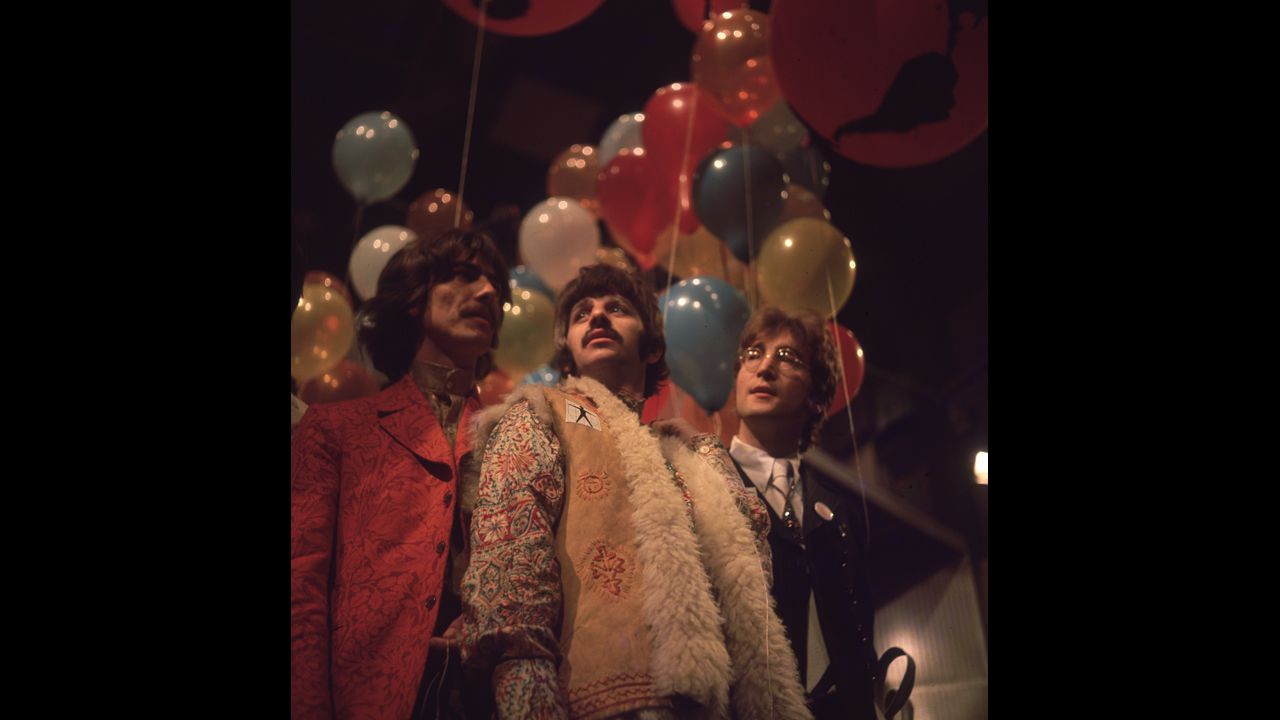 In stereotypical 1967 attire, George Harrison, Ringo Starr and John Lennon of the Beatles, at the EMI studios in Abbey Road, as they prepare for 'Our World', a world-wide live television show broadcasting to 24 countries with a potential audience of 400 million.  