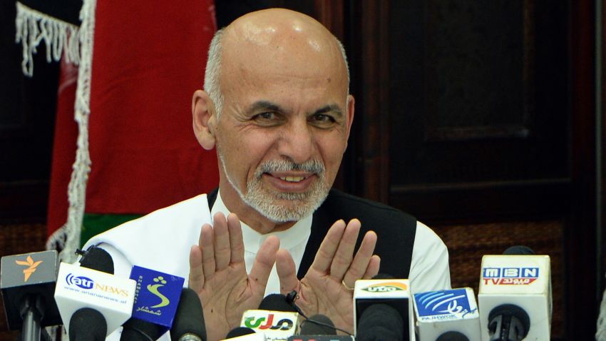 Afghan presidential candidate Ashraf Ghani gestures as he addresses a press conference in Kabul on July 5, 2014.
