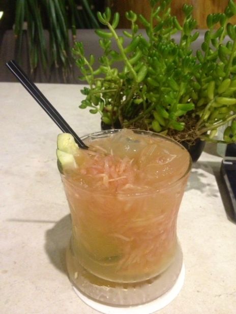 Gin Pom Pi is a refreshing mix of pomelo-infused gin, fresh calamansi (Philippine lime) juice, cucumber juice, Palawan honey and fresh pomelo shreds.