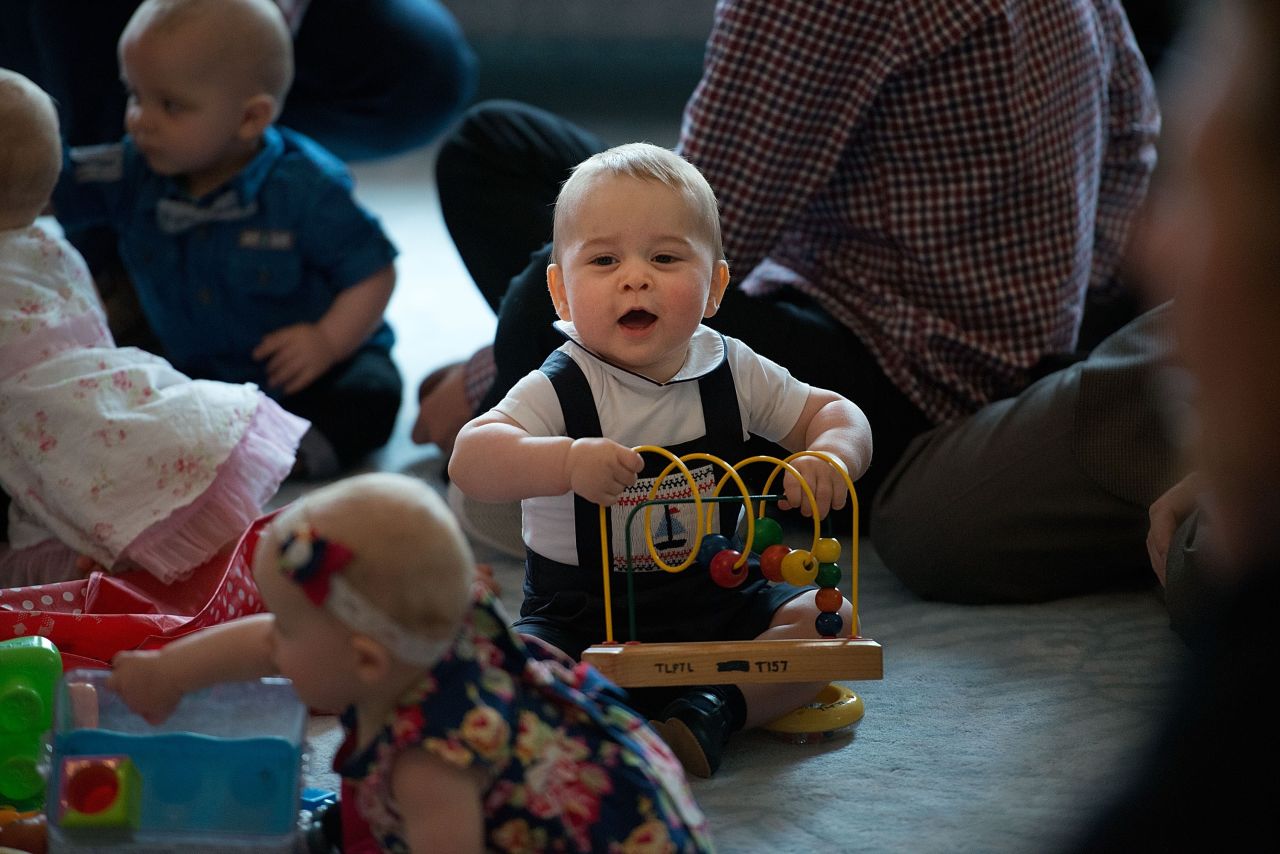 George plays with toys during a visit to the Government House in Wellington, New Zealand, on April 9.