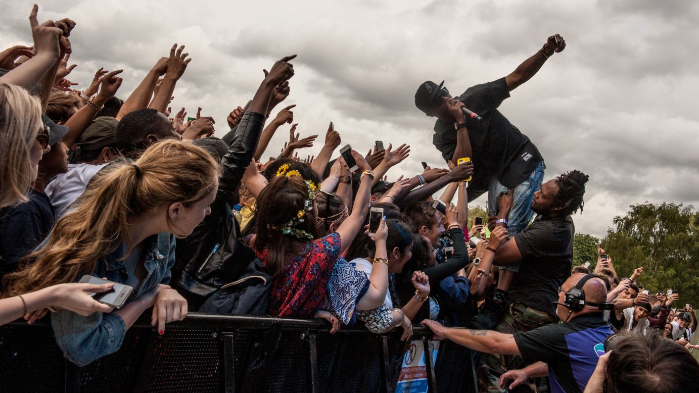 Hip-hop artist B.o.B. takes a selfie with fans at the Wireless Festival in Birmingham, England, on Friday, July 4.