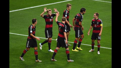 Germany's Toni Kroos, second from left, celebrates scoring his second goal of the game. It put his team up 4-0.