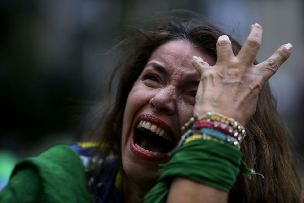 A Brazil soccer fan cries as she watches the match in Belo Horizonte.