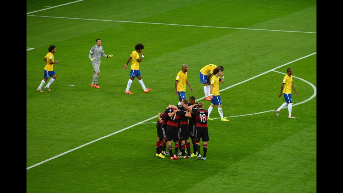 German players celebrate their fifth goal.