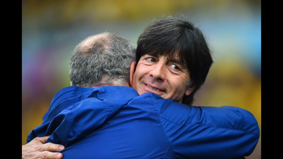 Brazil head coach Luiz Felipe Scolari, left, and German head coach Joachim Loew hug prior to the match.