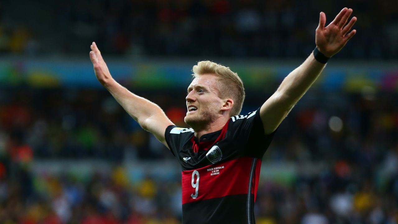 Andre Schuerrle of Germany celebrates scoring his team's seventh goal. It was his second goal of the game.