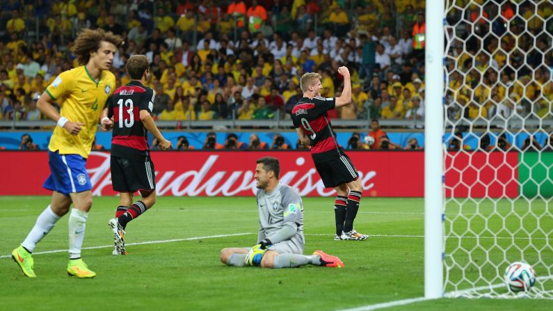 Schuerrle, right, pumps his fist after making the score 6-0.