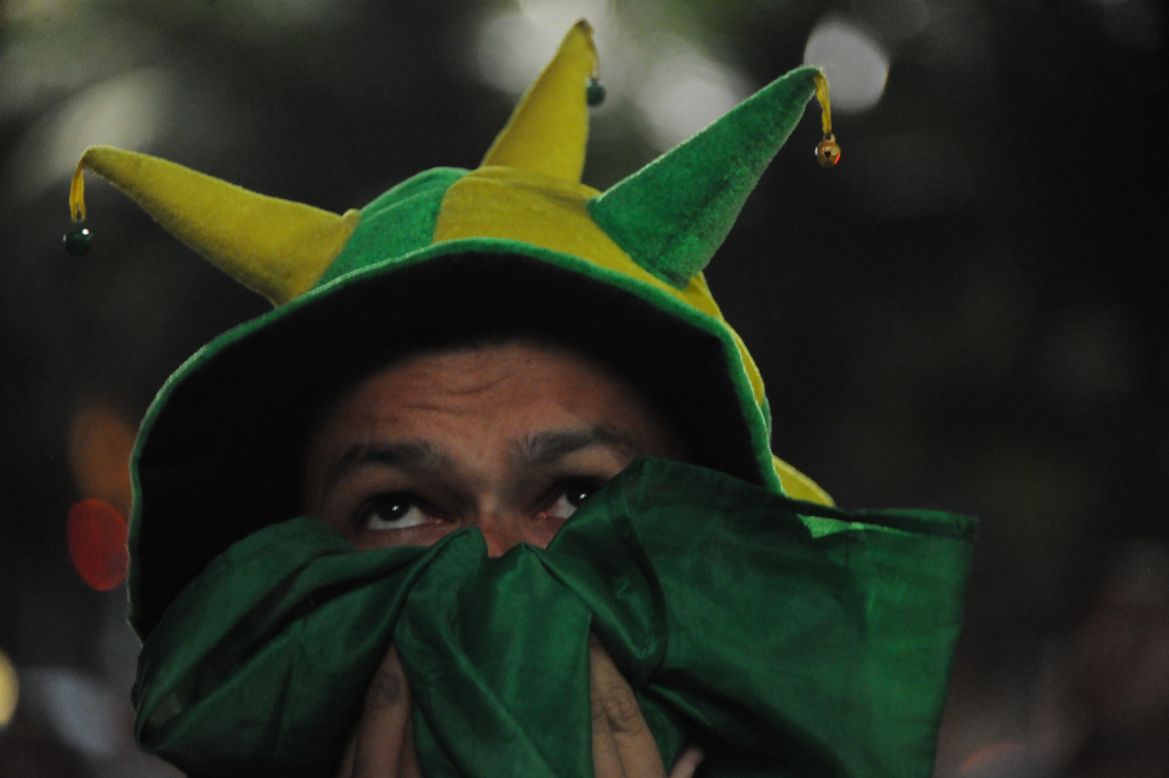A Brazil fan watches the match in Rio de Janeiro.
