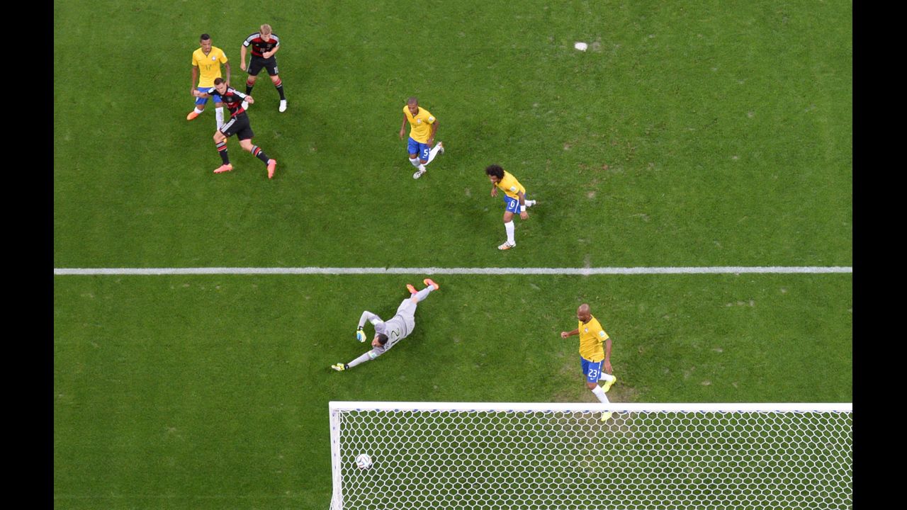 Germany's Miroslav Klose, second from left, scores his team's second goal. The goal also made Klose the all-time leading scorer in World Cup history.