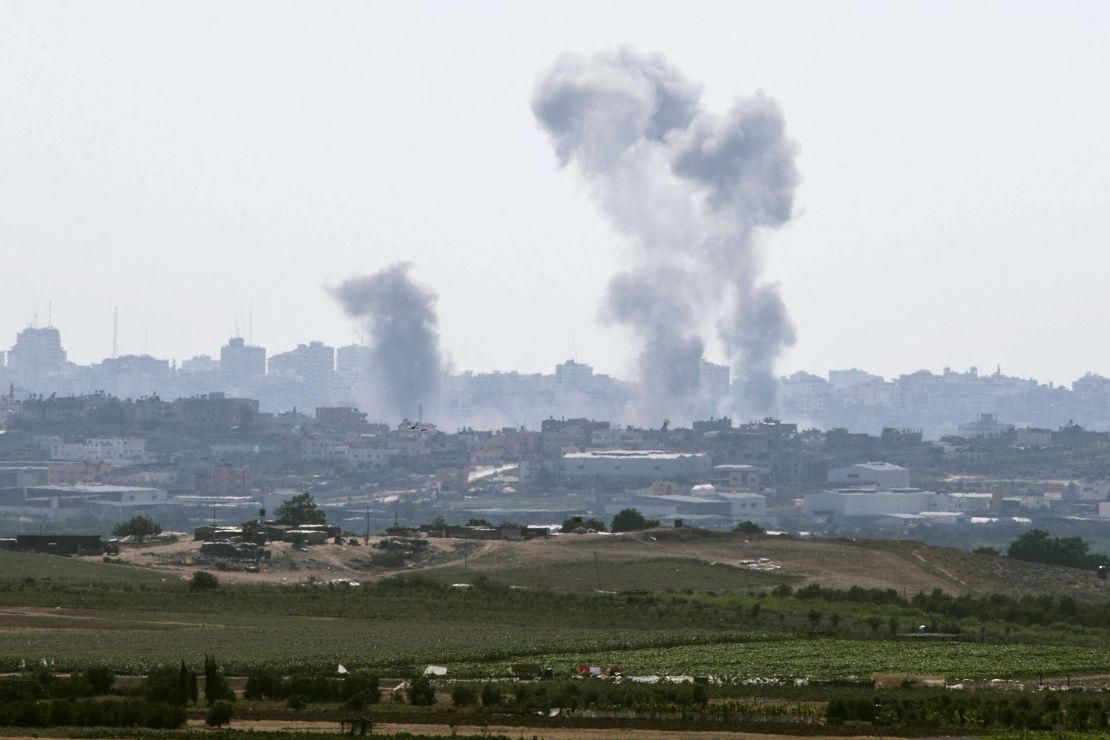 Smoke from an Israeli air strike rises over the Gaza Strip on July 8, 2014. 
