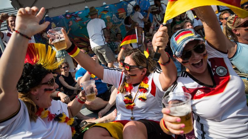 From left, Oona Hodos, Nathalie Dorner and Natascha Cozby celebrate in New York City after a German goal on July 8. Germany defeated Brazil 7-1 to advance to the final.