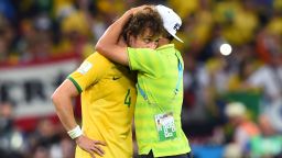 Thiago Silva of Brazil consoles David Luiz after Germany's 7-1 victory during the 2014 FIFA World Cup Brazil Semi Final match between Brazil and Germany at Estadio Mineirao on July 8, 2014 in Belo Horizonte, Brazil. (Photo by Buda Mendes/Getty Images)