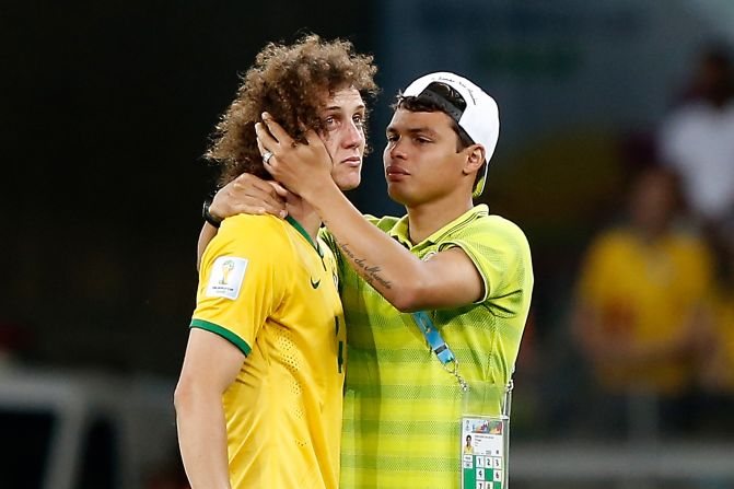 Brazil's stand-in captain David Luiz was left in tears after his side was thrashed 7-1 in the semifinal by Germany. Brazil, hoping to win the tournament for a sixth time, trailed 5-0 at halftime. Coach Luiz Felipe Scolari said it was the worst day of his life.