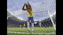 Brazil's Fernandinho reacts after Germany's Toni Kroos during scored his side's third goal during the World Cup semifinal soccer match between Brazil and Germany at the Mineirao Stadium in Belo Horizonte, Brazil, Tuesday, July 8, 2014. (AP Photo/Natacha Pisarenko)