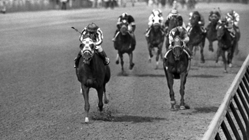 <strong>1973 Belmont Stakes: </strong>Announcer Chick Anderson knew it was a blowout, estimating Secretariat had won the race -- and the first Triple Crown in a quarter-century -- by 25 lengths. That was later amended to 31 lengths. In 2012, the Maryland Racing Commission ruled Secretariat's 1973 Preakness time was misrecorded, and the corrected time made Secretariat the fastest Triple Crown winner ever.