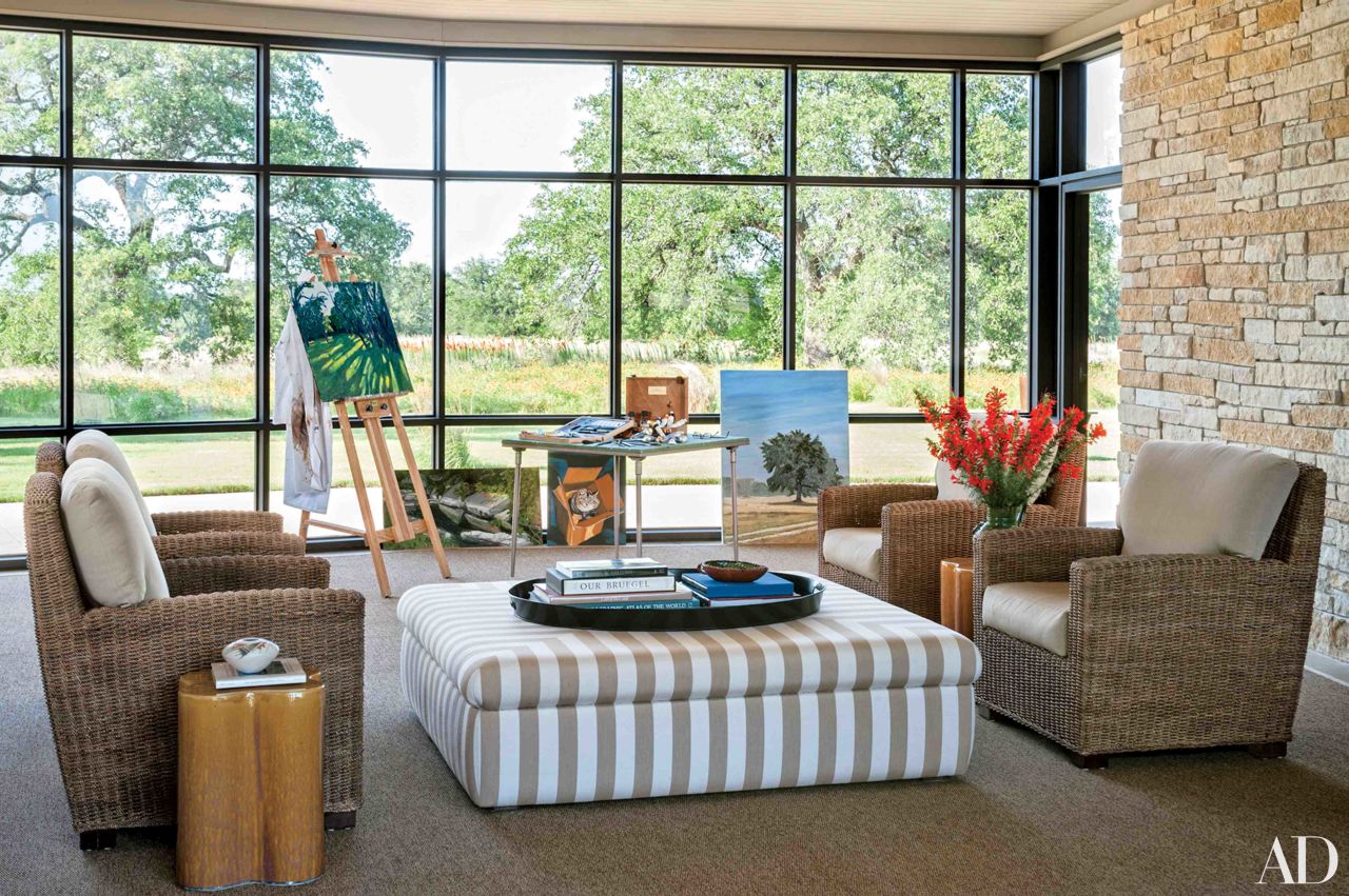 Breezeway: Mr. Bush sometimes paints at an easel in the enclosed breezeway, where the windows are replaced with screens in warm weather; the ottoman and the cushions on the sea-grass chairs are covered in Sunbrella fabrics. <a href="http://www.architecturaldigest.com/celebrity-homes/2014/laura-and-george-w-bush-prairie-chapel-ranch-texas-article?mbid=synd_cnn" target="_blank" target="_blank">See more at ArchDigest.com</a>