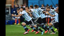 Argentina's players run to celebrate theiir victory after a penalty shoot out following extra-time in the semi-final football match between Netherlands and Argentina of the FIFA World Cup at The Corinthians Arena in Sao Paulo on July 9, 2014. AFP PHOTO / NELSON ALMEIDA        (Photo credit should read NELSON ALMEIDA/AFP/Getty Images)