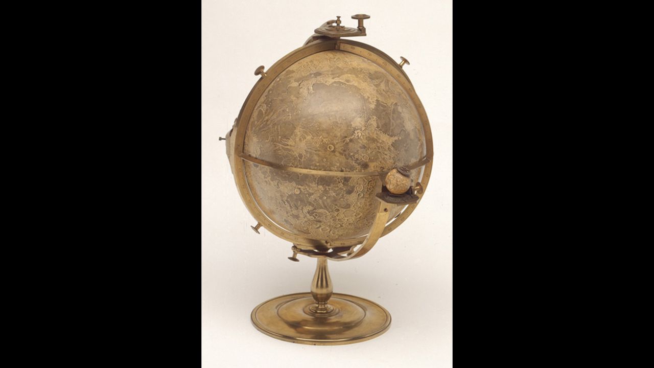 <strong><em>Selenographia by John Russell, circa 1797</em></strong><br /><br />John Russell was a well-known society portraitist in his day (in fact, several of his pieces hang at the National Portrait Gallery in London), but <em>Selenographia</em> is his most enduring creation. <br /><br />Russell observed the moon for 30 years before producing <em>Selenographia</em>. The subtle details show that he was just as dedicated to accuracy as he was to art. Consider, for example, how the larger sphere wobbles on its brass pedestal to imitate libration, the slight rocking motion experienced when watching the moon from Earth (which is represented by the smaller sphere.)<br /><br /><em>Selenographia is on display at the </em><a href="http://www.rmg.co.uk/royal-observatory" target="_blank" target="_blank"><em>Royal Observatory, Greenwich</em></a><em> until 4 January, 2015, as part of the Longitude Punk'd exhibition.</em><br />