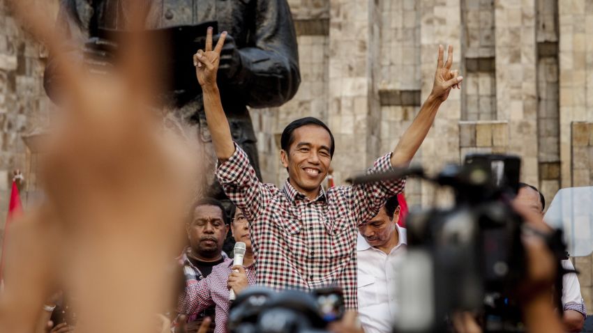 Indonesian Presidential Candidate Joko Widodo greets his supporters as he declares victory in the Indonesian Presidential election, although the vote counting is not complete, the race is very close, and the other Candidate Prabowo Subianto has also claimed victory in the race on July 9, 2014 in Jakarta, Indonesia.