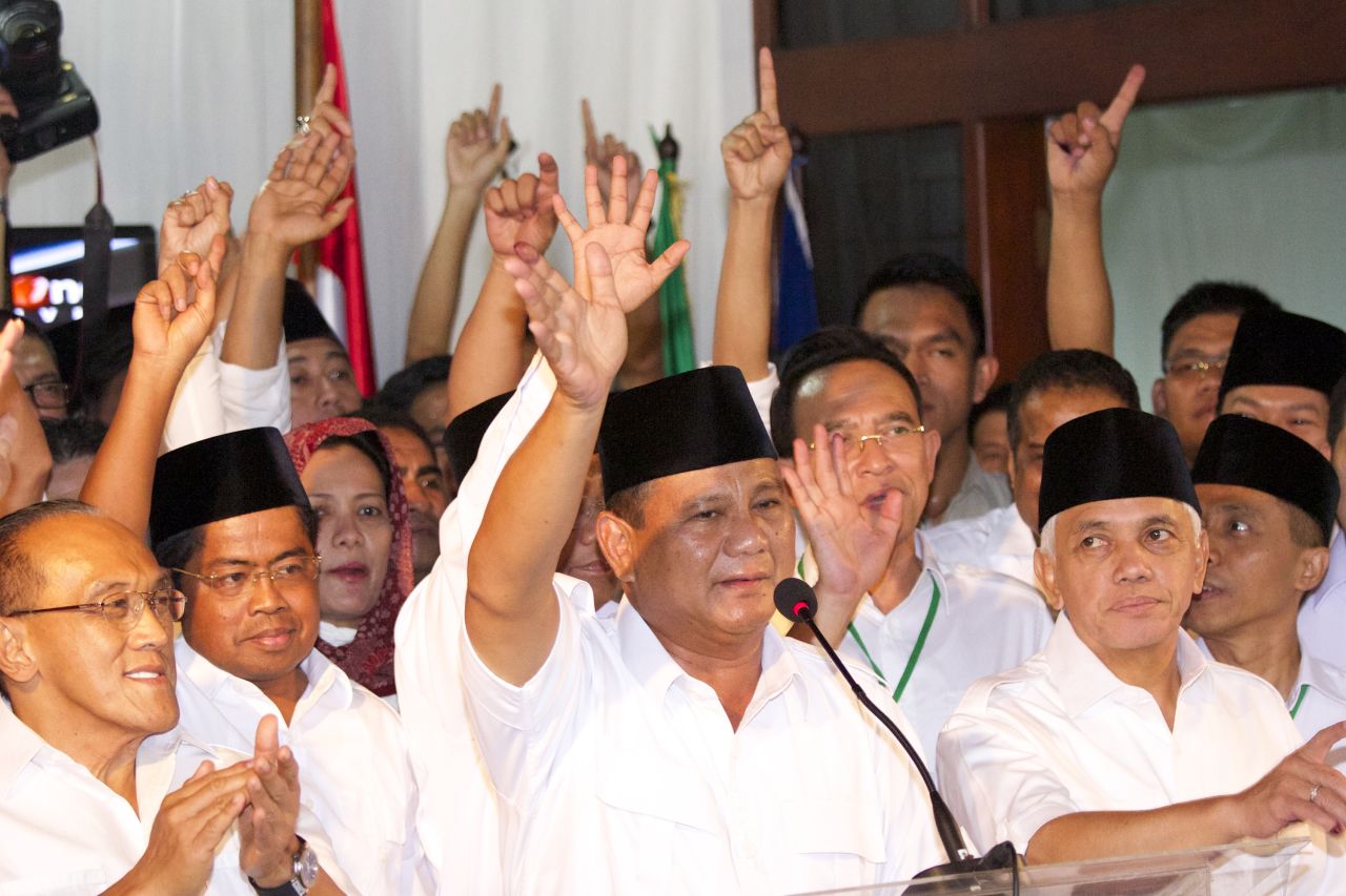 Indonesian presidential candidate Prabowo Subianto greets supporters as the vote count continues.