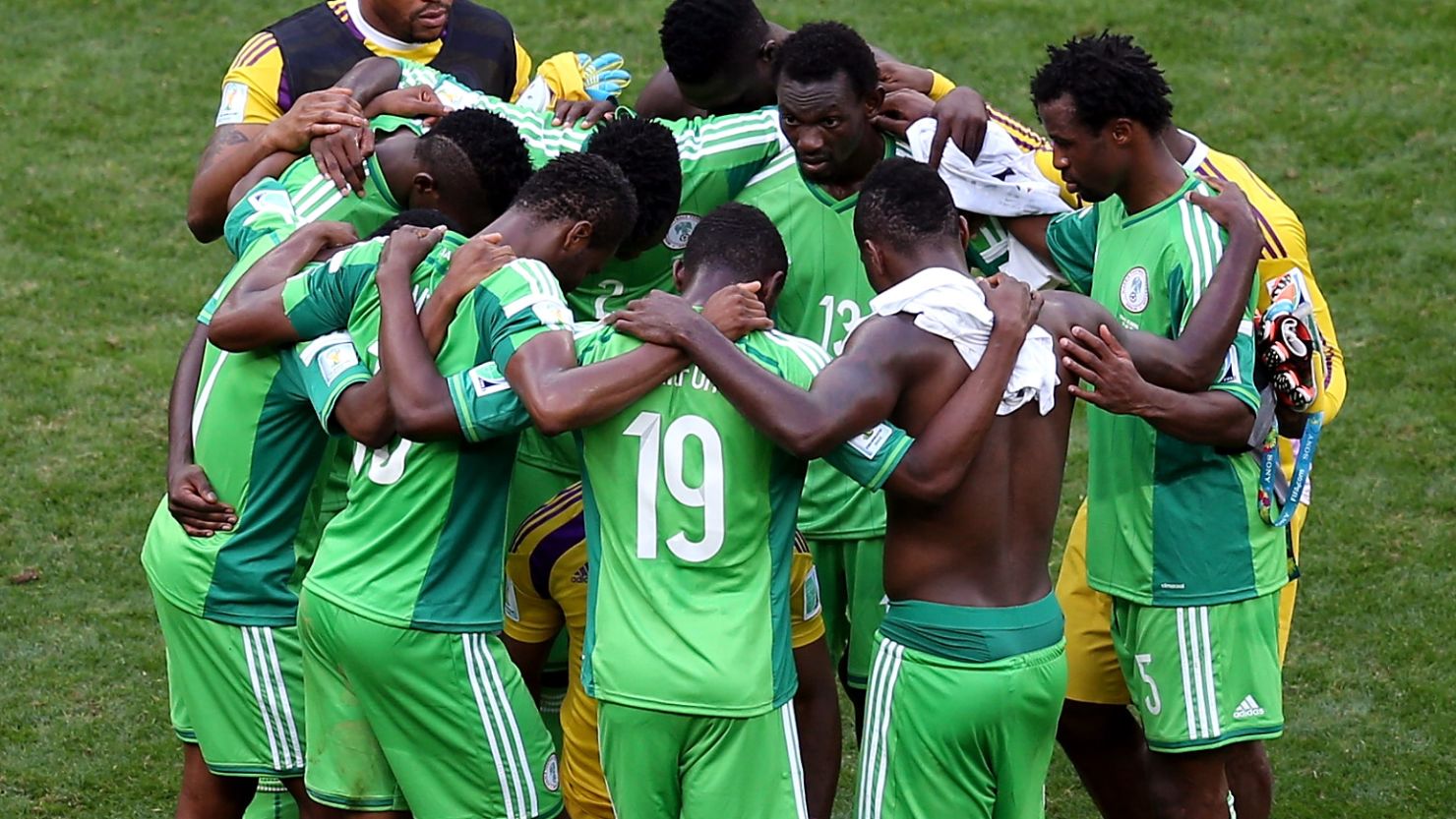 Nigeria's players form a huddle after a 2-0 defeat to France sent the African champions packing from Brazil 2014. 