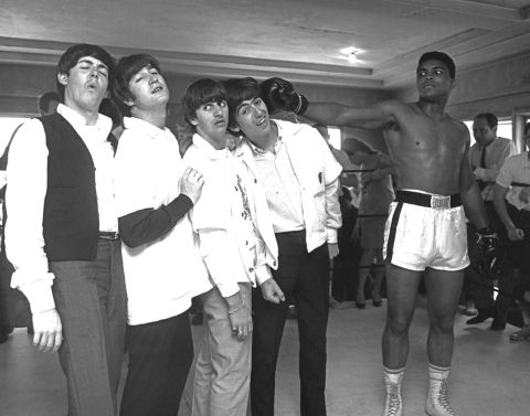 While in Miami, the Beatles meet Cassius Clay, the boxing champion who later became Muhammed Ali, in 1964.
