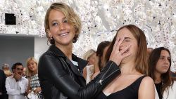 Jennifer Lawrence and Emma Watson attend the Christian Dior show as part of Paris Fashion Week - Haute Couture Fall/Winter 2014-2015 at Muse Rodin on July 7, 2014 in Paris, France.