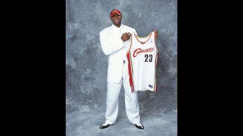 James poses with his new Cleveland Cavaliers jersey after he was drafted in June 2003.