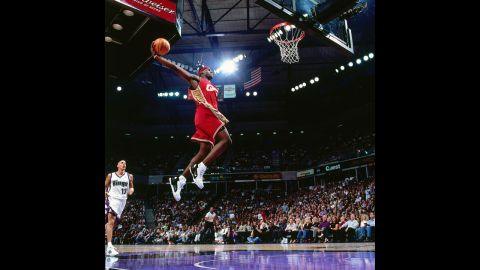 James goes for a dunk during an October 2003 game in Sacramento, California. In his first year in the NBA, he won the league's Rookie of the Year Award.