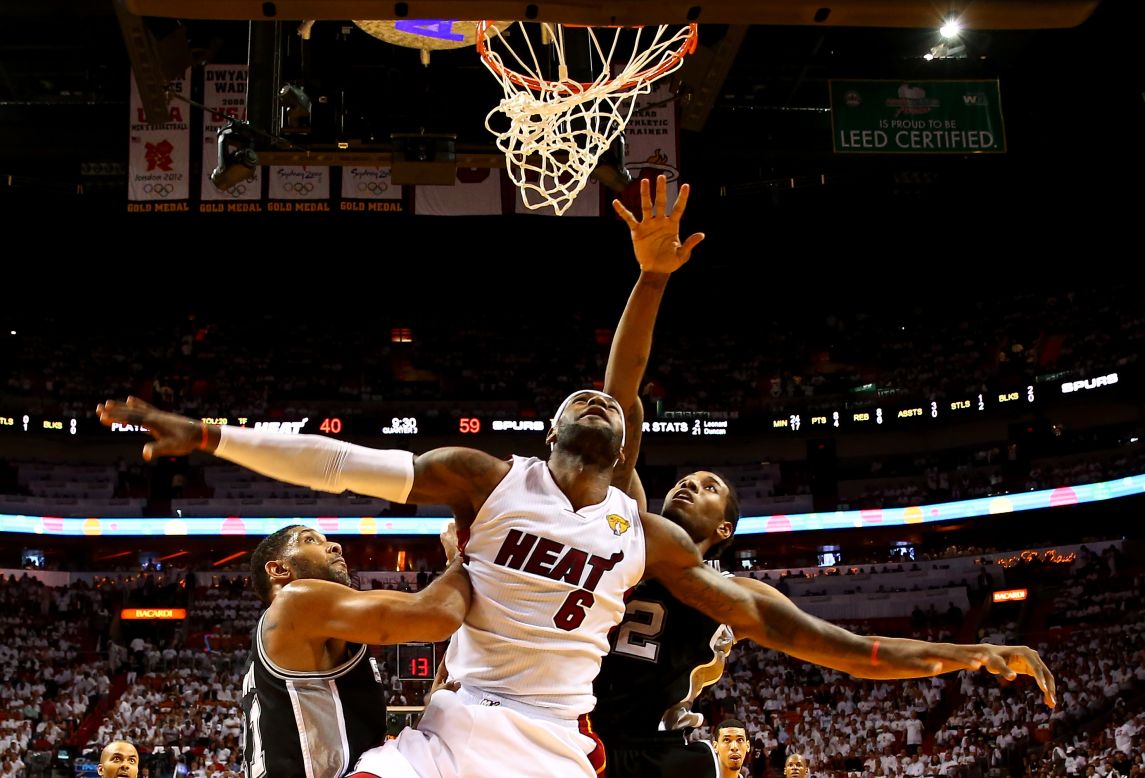 James competes against the San Antonio Spurs during the NBA Finals in June 2014. The Spurs won the series and prevented the Heat from winning three straight titles.