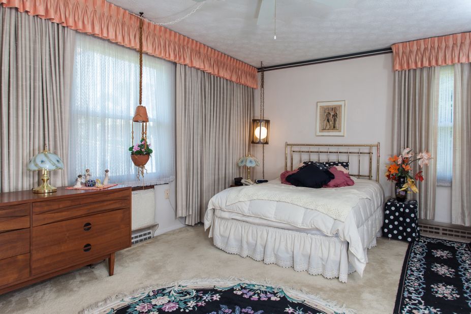 The bedroom, with its low-hanging light, has a charm that takes you back to an earlier era.