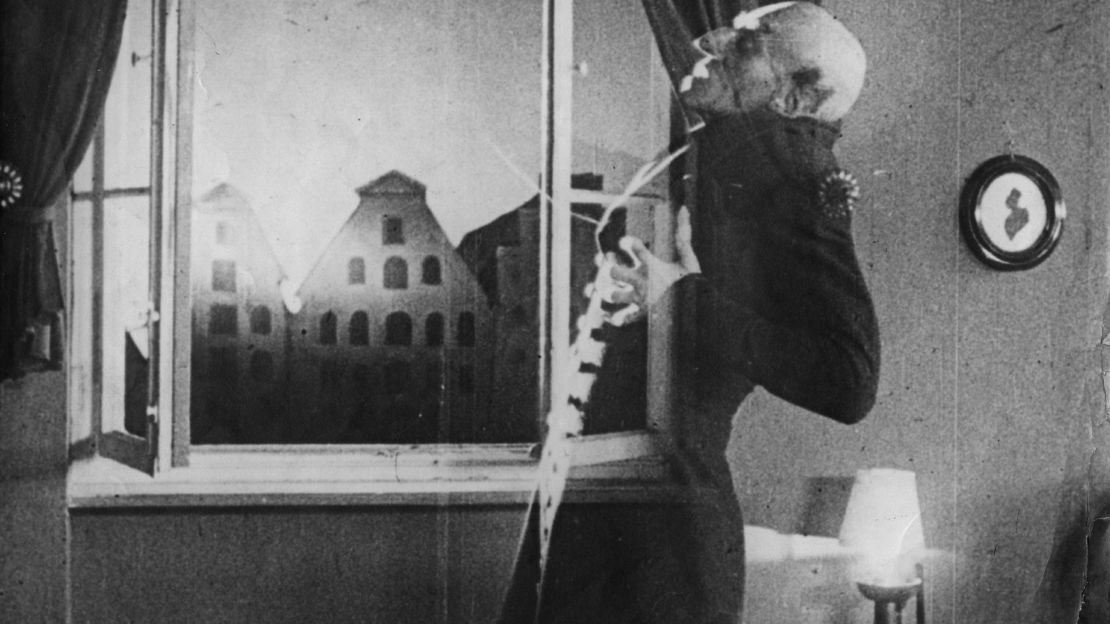 German actor Max Schreck (1879 - 1936), as the vampire Count Orlok, being destroyed by sunlight, in a still from F. W. Murnau's expressionist horror film, 'Nosferatu, Eine Symphonie Des Grauens', 1921. 