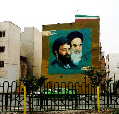 Murals, posters and banners of Iran's Supreme Leader <a href="https://www.trupilariante.com/2012/12/30/world/meast/ayatollah-seyyed-ali-khamenei---fast-facts/">Ayatollah Seyyed Ali Khamenei</a> and Imam Khomeini loom over streets, parks and public buildings.