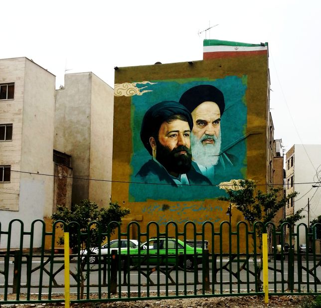 Murals, posters and banners of Iran's Supreme Leader <a href="http://edition.cnn.com/2012/12/30/world/meast/ayatollah-seyyed-ali-khamenei---fast-facts/">Ayatollah Seyyed Ali Khamenei</a> and Imam Khomeini loom over streets, parks and public buildings.